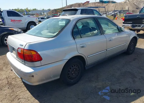 1999 Honda Civic Ex from USA, damaged, VIN 1HGEJ8647XL024334
